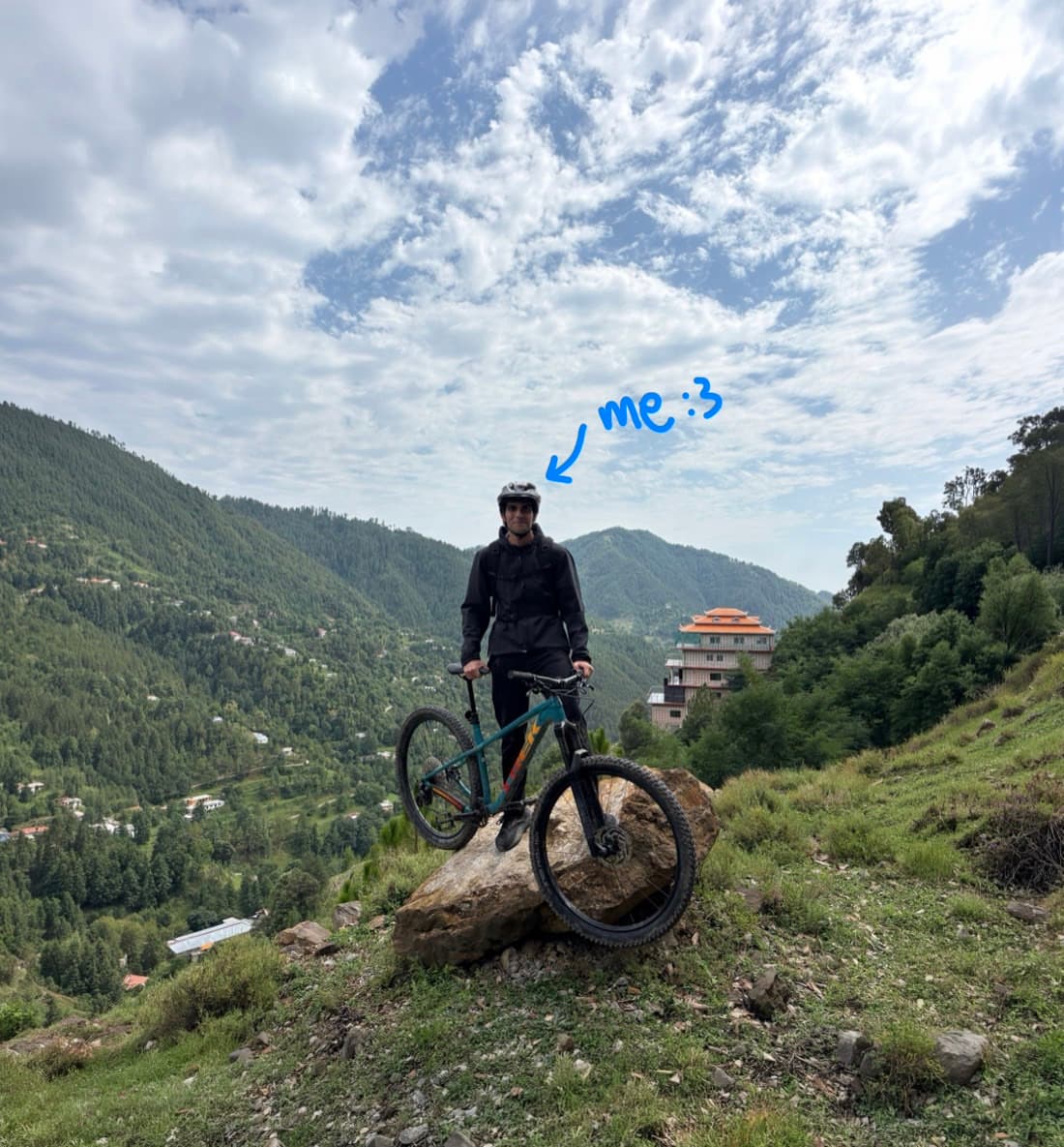 Shahum Malik riding a mountain bike